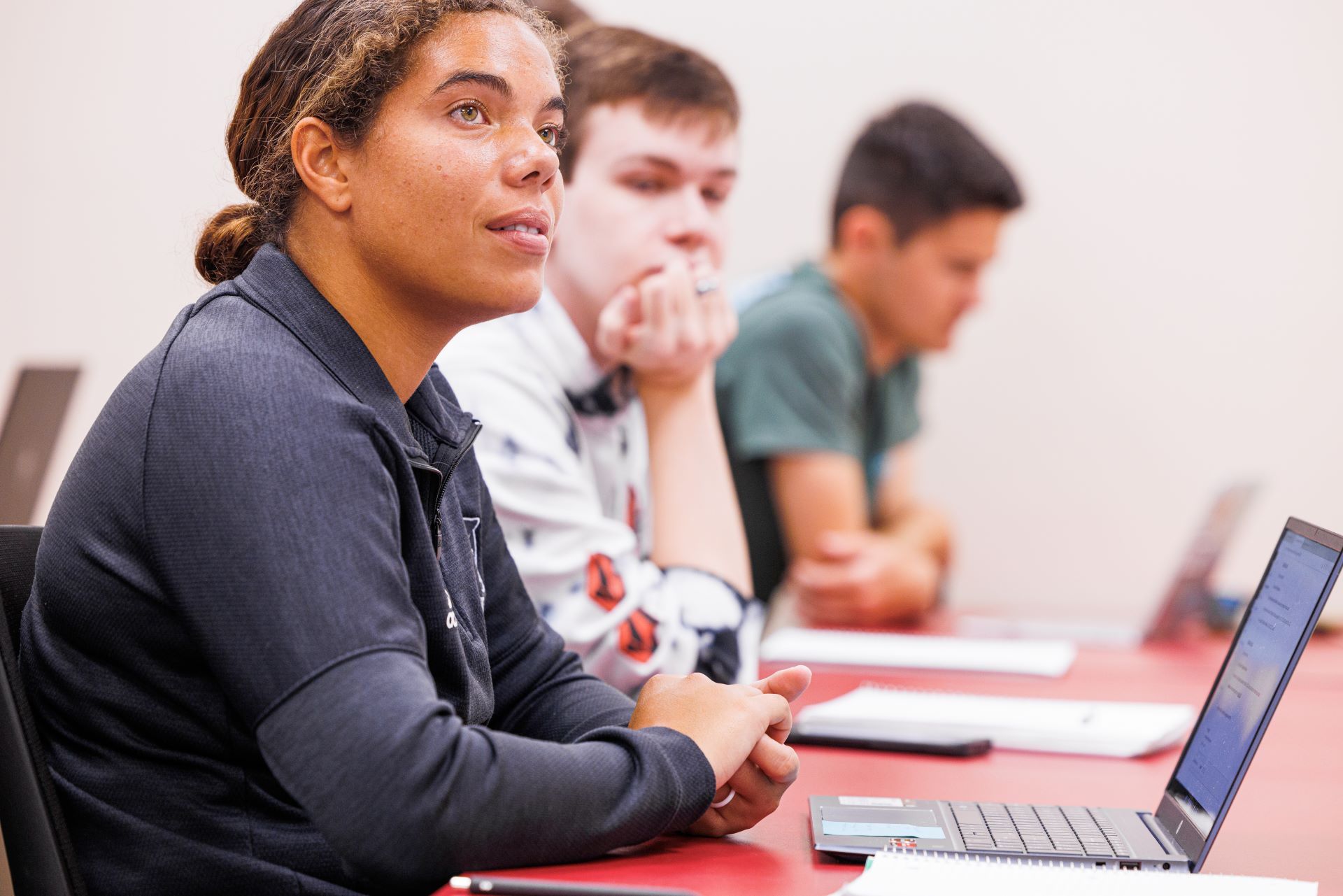 Students listening attentively in a classroom